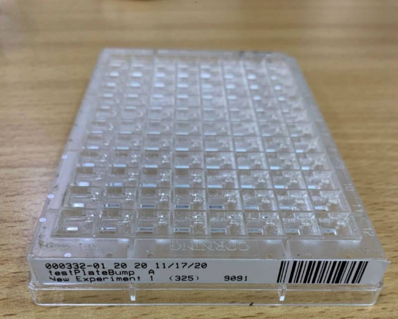 A Barcode Label Is Properly Attached to the Short Side of the Plate